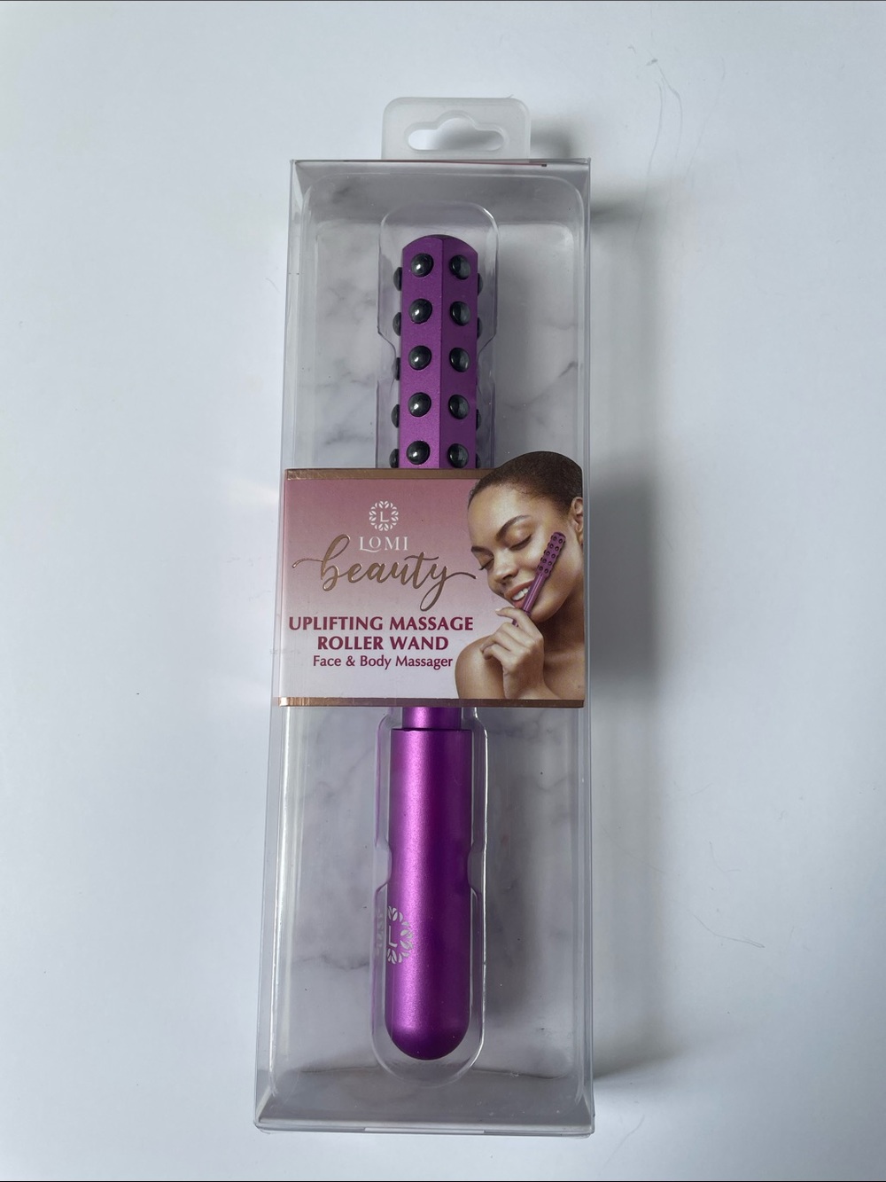 NIB Uplifting Massage Roller Wand.
